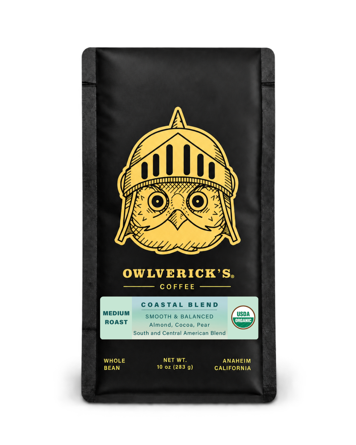 10 oz bag of Owlverick's Coastal Blend Coffee in a matte black bag with a gold owl helmet logo and product details on the front, shown against a plain white background.