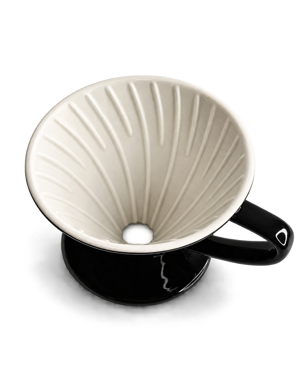 A ceramic pour-over coffee dripper with a cream-colored ribbed cone and a black base with a black handle, shown on a white background.