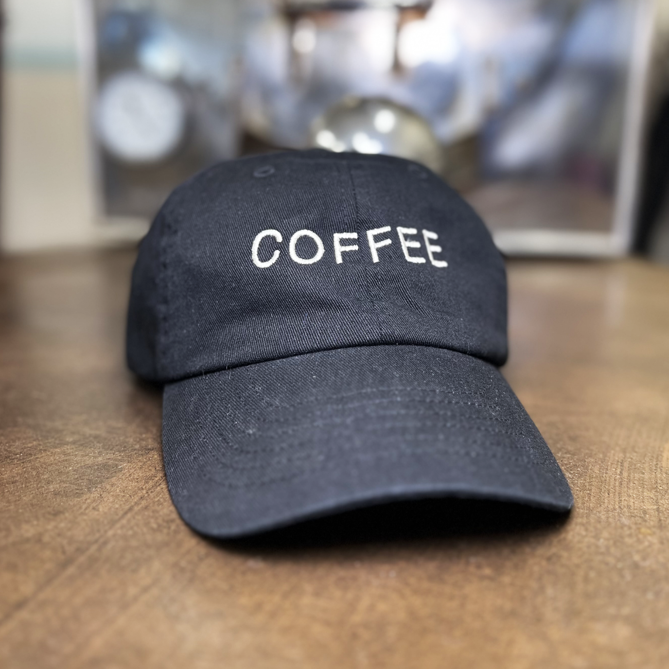 Dad hat in Black color with "COFFEE" embroidery