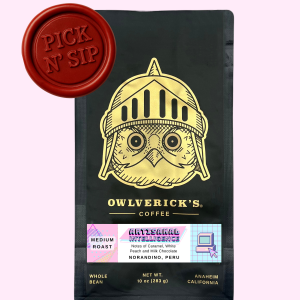 Front of Black Coffee Bag with Owl Design named Artisanal Intelligence. Red stamp says "Pick N' Sip" to designate that this is for a pickup only product. Pickup is June 12, 2026 between 9am and 12pm.